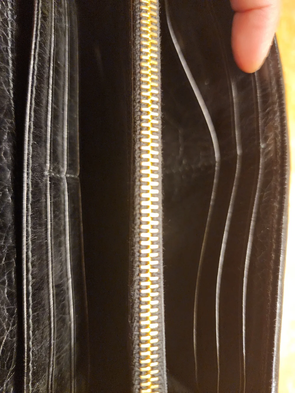 black quilted leather Miu Miu Matelassé long bifold wallet gold-tone Logo